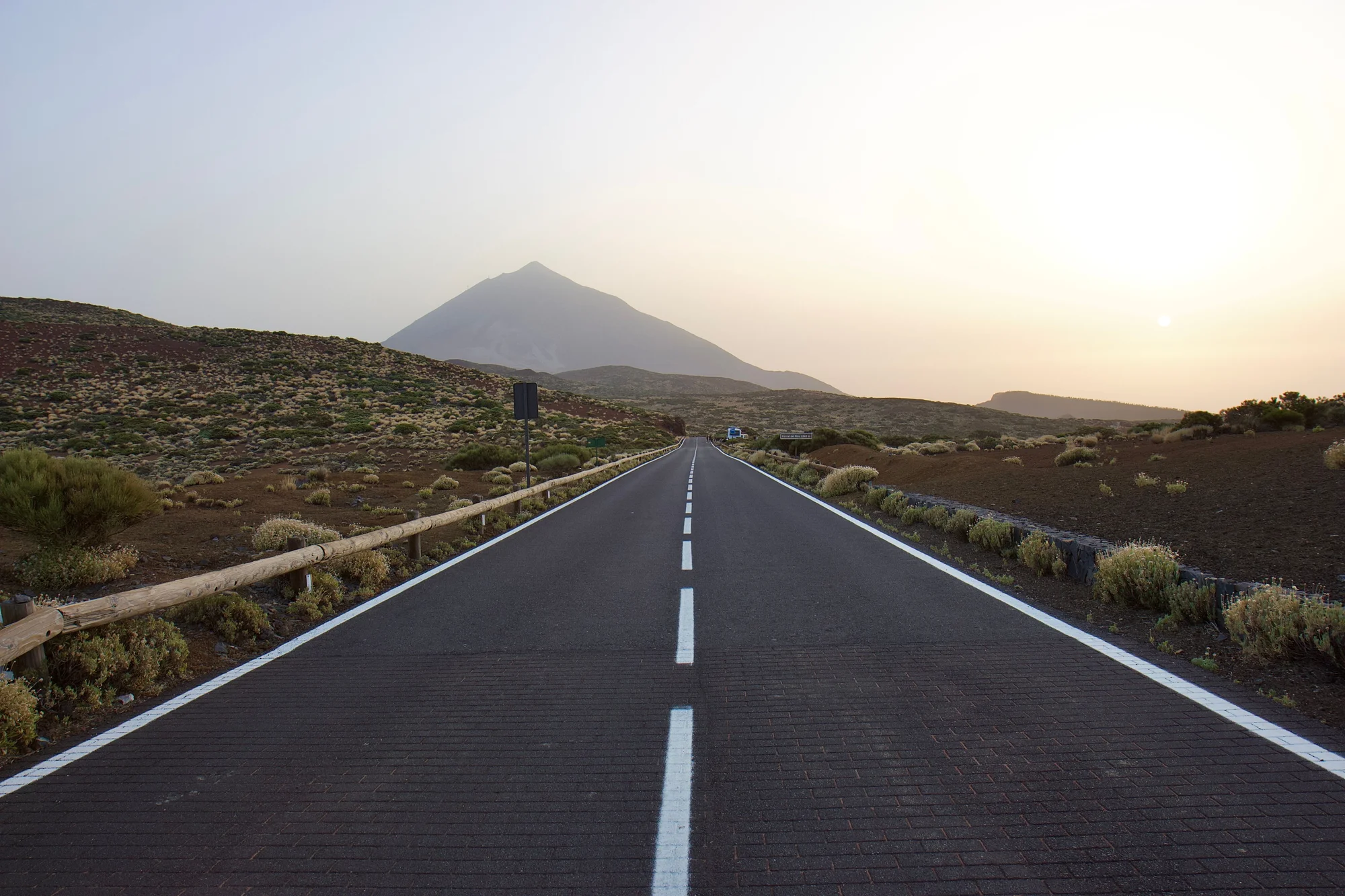 A road climbing towards Teide at sunrise